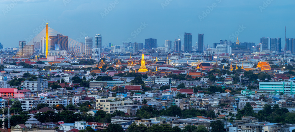 Aerial view of Bangkok City skyline by Chao Phraya River in Thailand.
