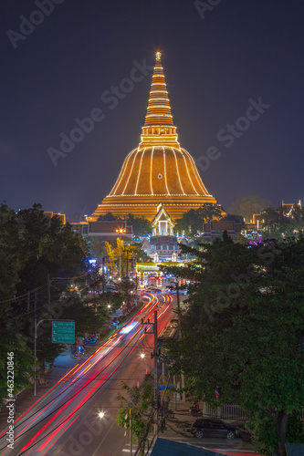 Time lapse of aerial view of Phra Pathom Chedi stupa temple in Nakhon Pathom near Bangkok City, Thailand. Tourist attraction. Thai landmark architecture. Golden pagoda at sunset.