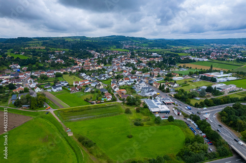 Aerial view of the village Hilbringen on a cloudy day in summer  © GDMpro S.R.O