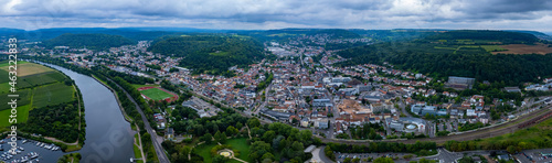 Fototapeta Naklejka Na Ścianę i Meble -  Aerial view of the city Merzig on a cloudy day in summer