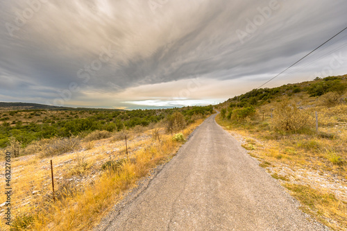 Sunrise over road in Causse Blandas