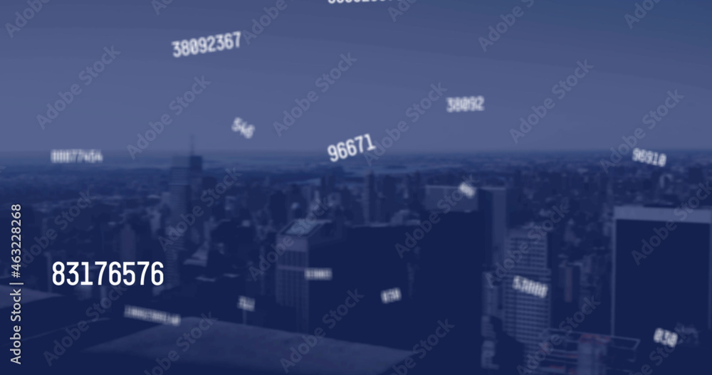 Image of falling numbers over cityscape
