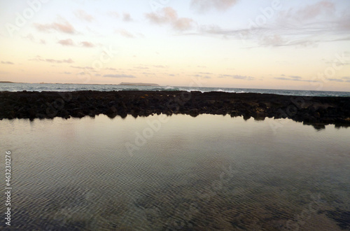 Fototapeta Naklejka Na Ścianę i Meble -  Perfect sunrise reflect in a natural sea lake 