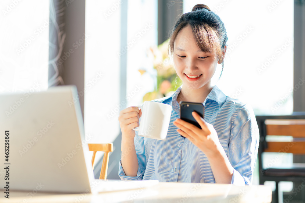 Portrait of Asian businesswoman working in a cafe Portrait of Asian businesswoman working in a cafe