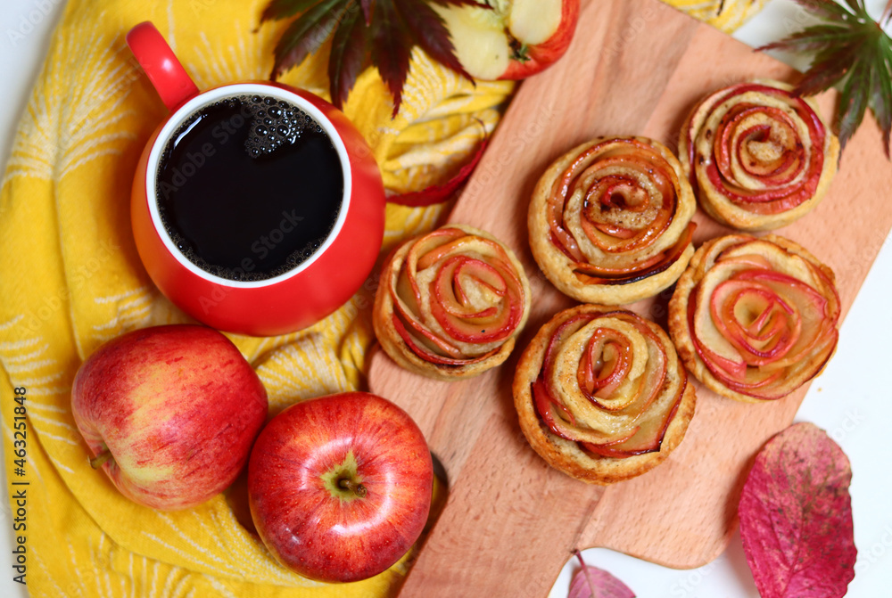 custom made wallpaper toronto digitalCup of black tea and apple cupcakes. Close up photo of beautiful dessert tart. Rose shaped Apple Pies on a table.