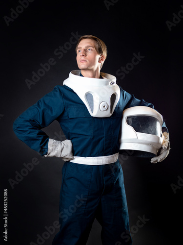 Obraz na plátne An astronaut or a space tourist. A young man in a spacesuit