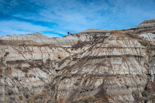 Fossil hunters on a ridge in Horse Thief Canyon in the Red Deer River valley near Drumheller, alberta, Canada