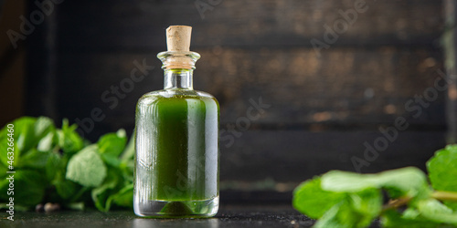 oil green herbs and spices, garlic, parsley, dill, basil fresh mint meal snack on the table copy space food background  