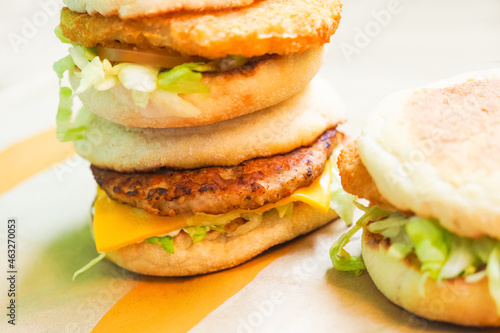Breakfast burgers, Fresh Muffins with Chicken and pork cutlets photo