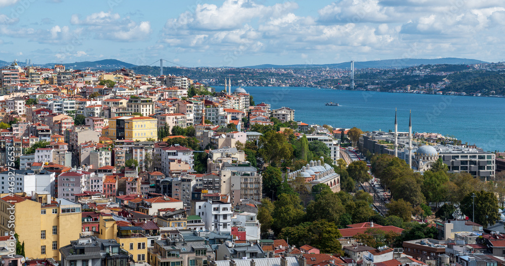 ISTANBUL, TURKEY - OCTOBER 12 ,2021: Istanbul city view from Suleymaniye Mosque in Turkey. Golden Horn bay of Istanbul and view on mosque with Sultanahmet district