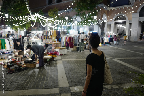 Series photo of young women shopping in night street market , Chaing mai north of thailand