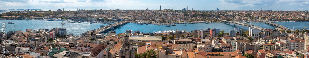 ISTANBUL, TURKEY - OCTOBER 12 ,2021: Istanbul city view from Galata tower in Turkey. Golden Horn bay of Istanbul and view on mosque with Sultanahmet district. Galata, Ataturk and Halic Bridge