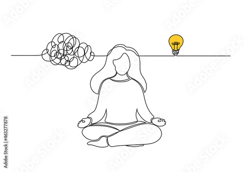 Woman come up with an idea after meditation. Girl meditates in lotus pose. Clearing away the mind's chatter concept. Developing of creativity.