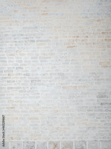 Beautiful white brick wall texture background (with brown and gray stains)