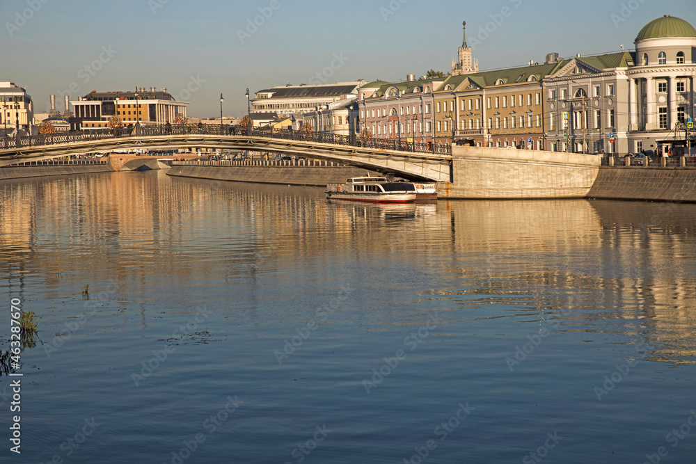 Russian scene: River trips on the Moscow river, view for the Vodootvodny canal in Moscow near Bolotnaya square at dusk