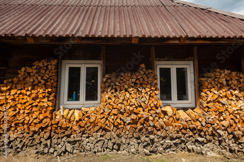 A country house covered with wood logs  Carpathians  Ukraine