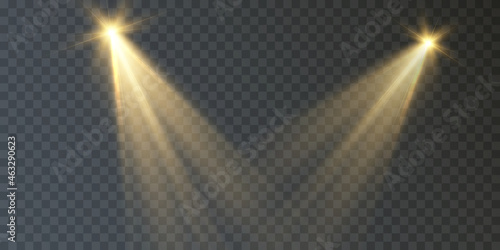 Spotlights set isolated on transparent background. Vector glowing light effect with golden rays and lens flares.	