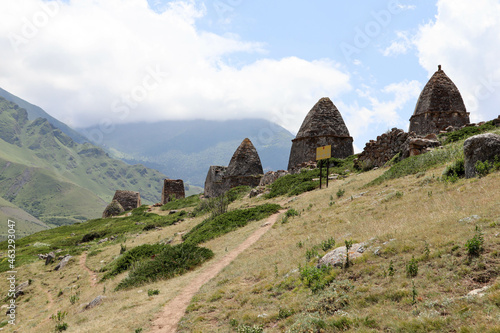 ancient ruined conical old abandoned tombs in  city of dead  necropolis in Eltubu  Chegem Valley  slopes of Caucasus mountains  Russia