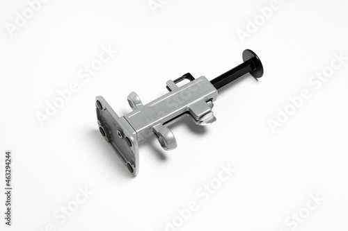 Cherry Pitter. Cherry and plum stoner on white background. A tool for removing cores from fruit.High-resolution photo.