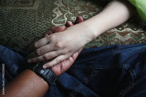 Point-of-view (POV) of a man holding a woman's hand