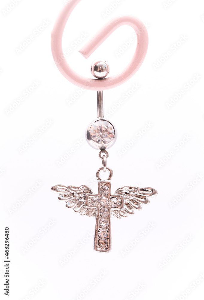 A set of jewelry for piercing on a white background. A set of earrings for the body, nose, navel, tongue, nipples, ears, various beauty jewelry, a set of cosmetological jewelry for piercing. A set of jewelry for piercing on a white background. A set of earrings for the body, nose, navel, tongue, nipples, ears, various beauty jewelry, a set of cosmetological jewelry for piercing.