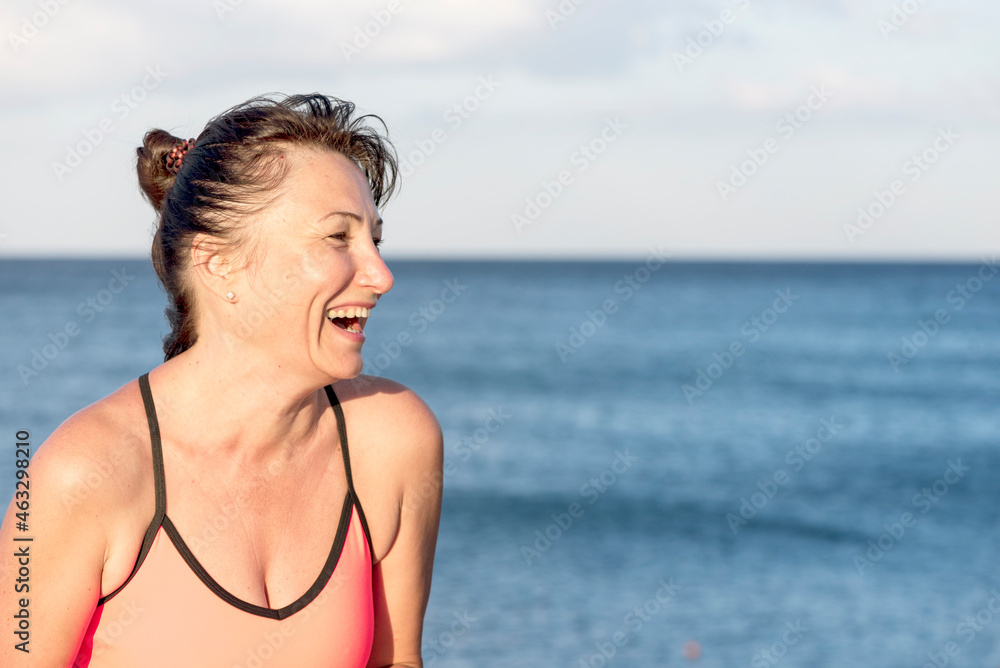 Portrait of a happy woman after playing sports, fitness, yoga. Healthy lifestyle concept Portrait of a happy woman after playing sports, fitness, yoga. Healthy lifestyle concept