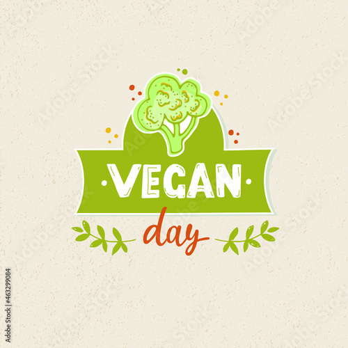 Happy Vegan Day emblem 
 with hand drawn text, broccoli and leaves. Greeting card for World Vegan Day on 1st of November. Hand lettering. Doodle style vector illustration on textured background