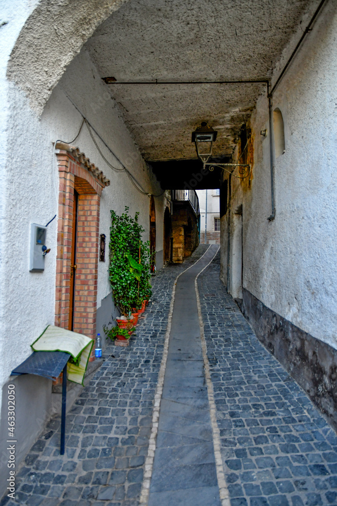 A narrow street of Strangolagalli, a medieval town of Lazio region, Italy.
