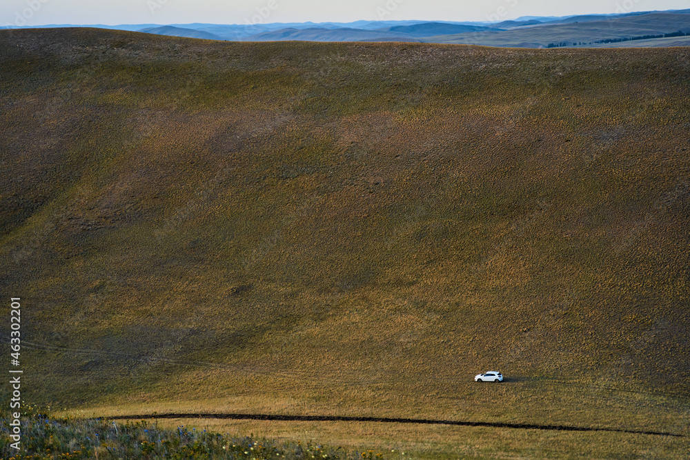 Naklejka premium Aerial View of the Long Mountains Ridge. The beginning of the Ural mountains. Orenburg region. High quality photo