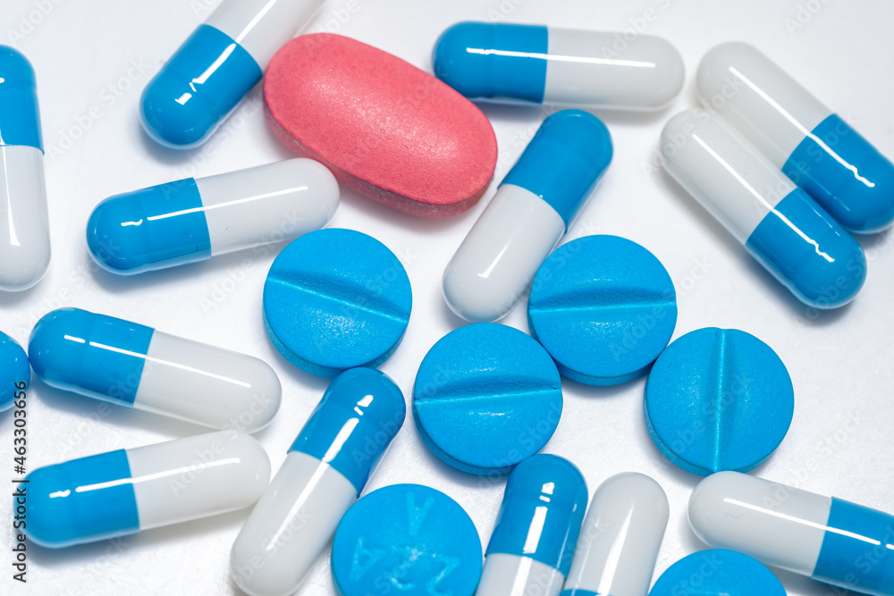 Top view of assorted pharmaceutical medicine pills, tablets and capsules.Pills background. Top view of assorted pharmaceutical medicine pills, tablets and capsules.Pills background.