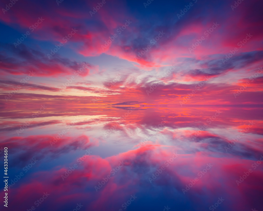 Magnificent view of the sundown over water surface.