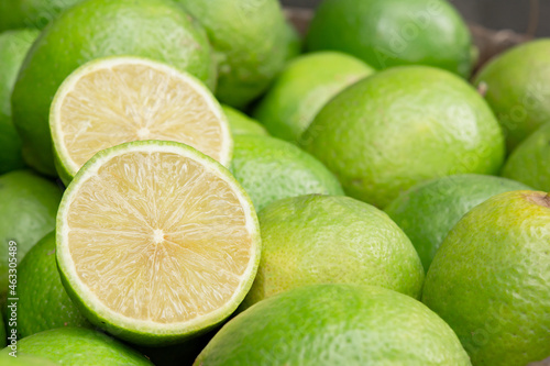 Lime slice citrus fruits background. Fresh juicy limes. Healthy food.