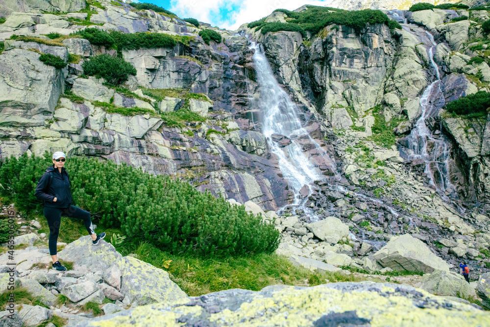 Panoramic view of Skok waterfall and the lake in the western part of High Tatras, Slovakia - obrazy, fototapety, plakaty 