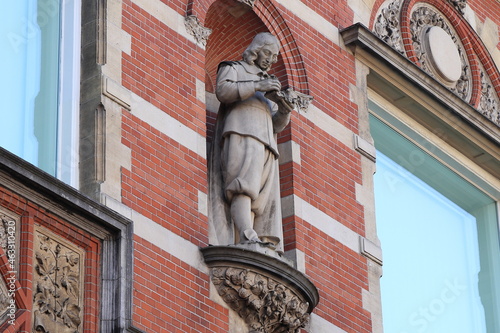 Amsterdam Stedelijk Museum Facade Detail with Statue, Netherlands photo