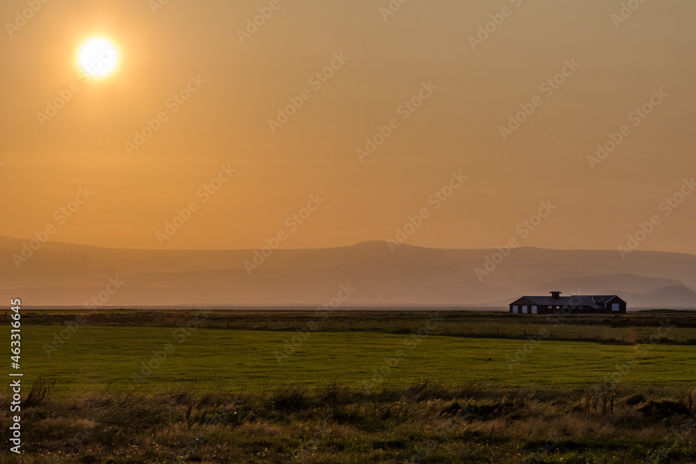 Fototapeta premium Sunset at Icelandic farm