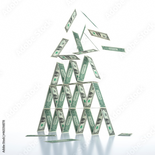 House of cards made of Dollar bank notes collapsing on white background photo