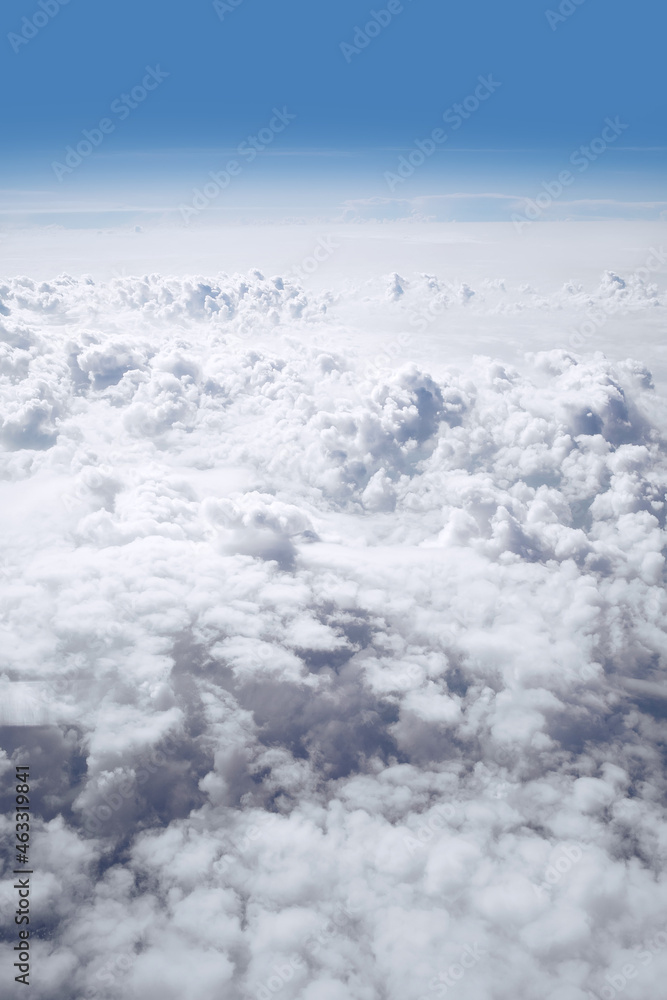 Vertical landscape of fluffy cumulus cloudy sky Vertical landscape of fluffy cumulus cloudy sky
