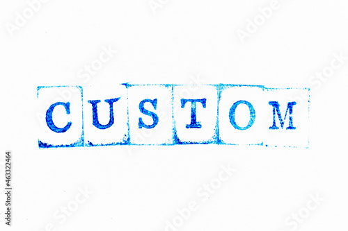Obraz na plátně Blue color ink rubber stamp in word custom on white paper background