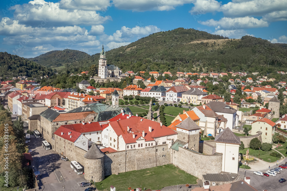 Aerial view of Kremnica, well-preserved medieval town built above important gold mines is the site of the oldest still-working mint in the world, city walls, towers, fortified gate