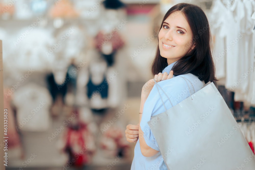 Happy Customer Holding a Shopping Bag Looking at the Camera Happy Customer Holding a Shopping Bag Looking at the Camera