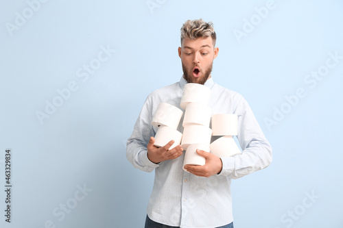 Surprised young man with ma...