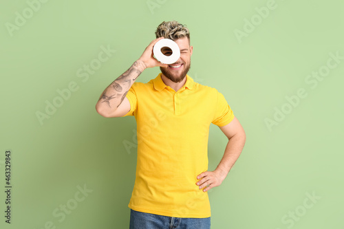 Young man with toilet paper...