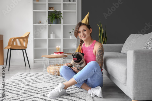 Young woman celebrating her...