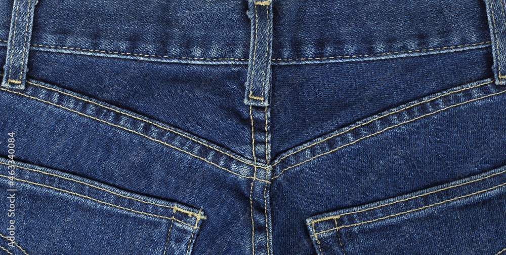 Clothes, shoes and accessories - Top view closeup fragment blue jeans pockets Clothes, shoes and accessories - Top view closeup fragment blue jeans pockets