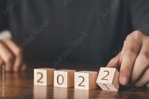 Wallpaper Mural The young man did a flipping cube block for 2021 to 2022...Concept Happy Christmas and Happy New Year. Torontodigital.ca