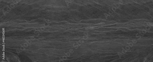 Abstract dark grey black slate background or texture.