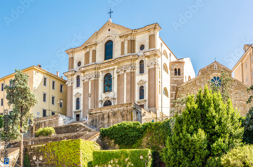 View at the Church of Santa Maria Maggiore and Basilica of San Silvestro in the streets of Trieste - Italy photo