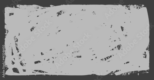 Dirty grunge background. The monochrome texture is old. Vintage worn pattern. The surface is covered with scratches
