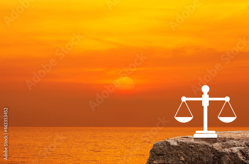 Obraz na plátne Law flat icon on rock mountain over sunset sky and sea, Business legal service c