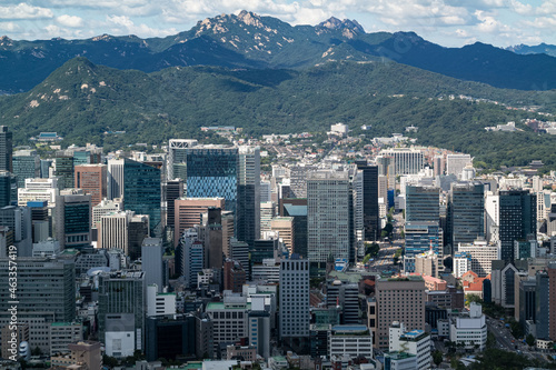 The buildings in Jongno and the scenery of Bukaksan Mountain in Seoul, South Korea.